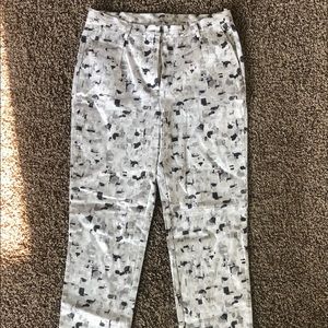 White pants with geometric black and gray pattern